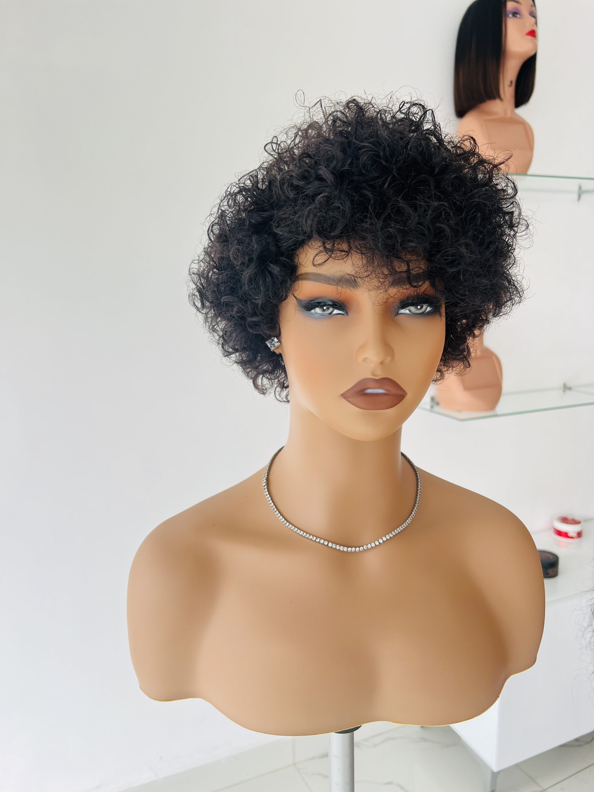 Human hair pixie curls in black