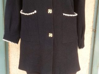 Black-Heavy-Sweater-with-cream-buttons-and-ebroidered-neck-and-pockets